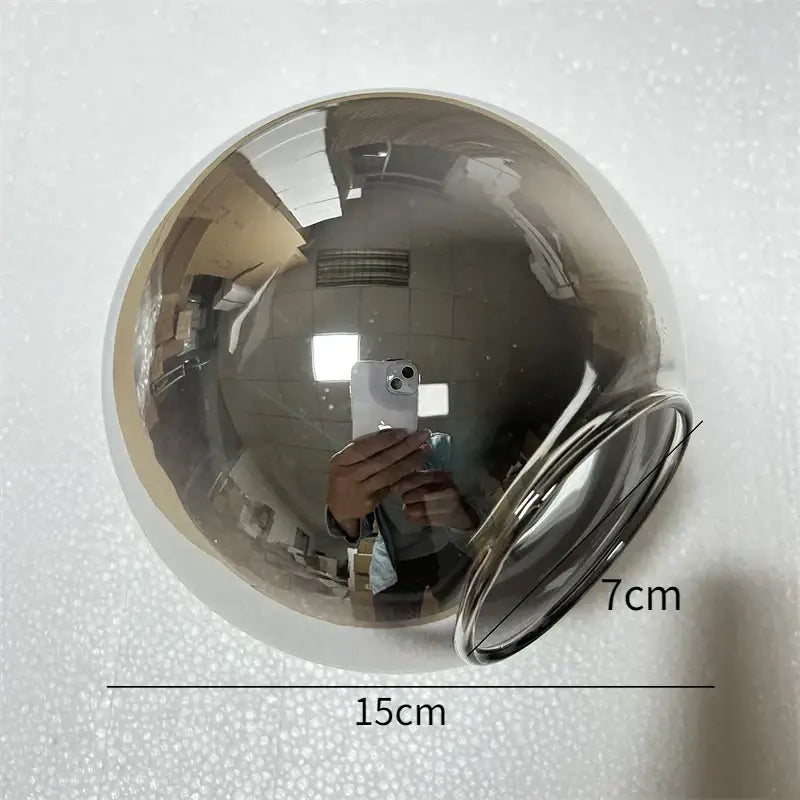 A polished chrome glass ball pendant with 15cm diameter and 7cm ring for decorbites glass ball living room decor