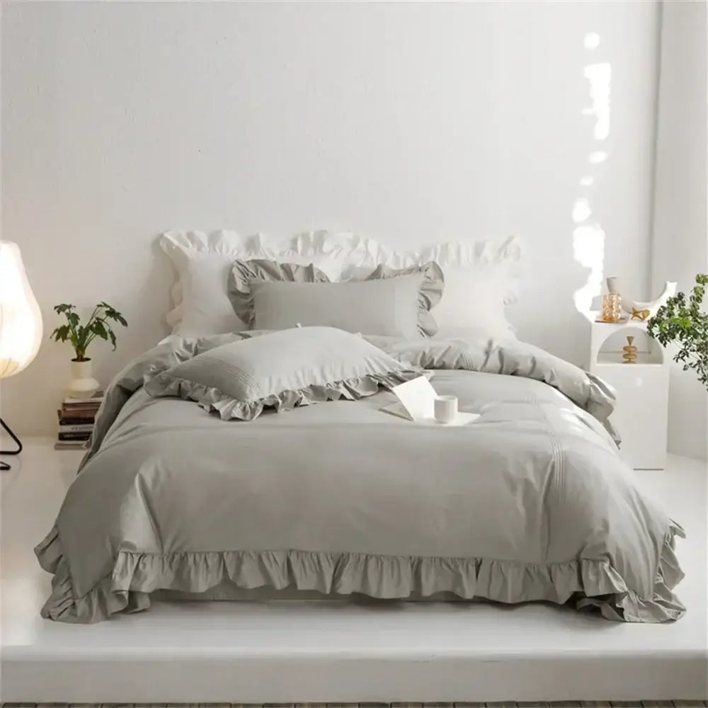 Gray ruffled bedding set with soft flowing fabric and delicate frayed edges for decorbites light green bedroom decor