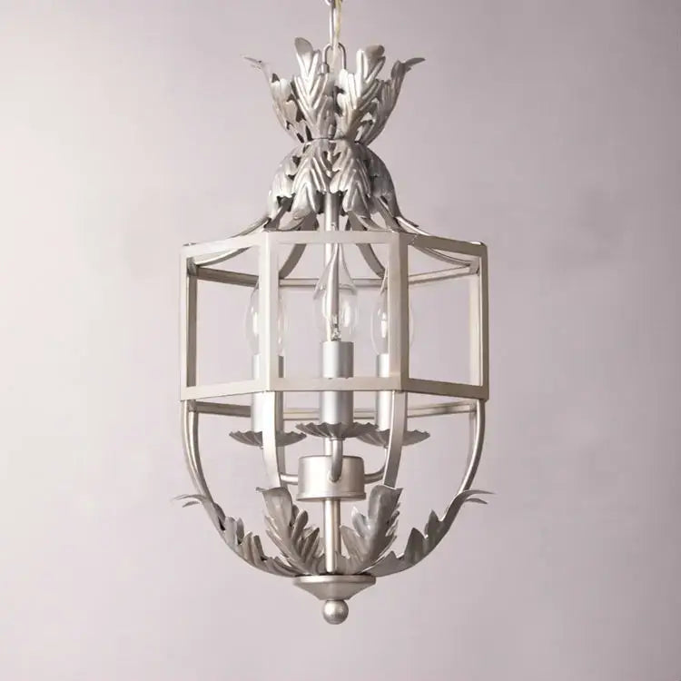 Silver-toned decorbites grey gold metal cage lantern with ornate leaf motifs for kitchen lighting decor