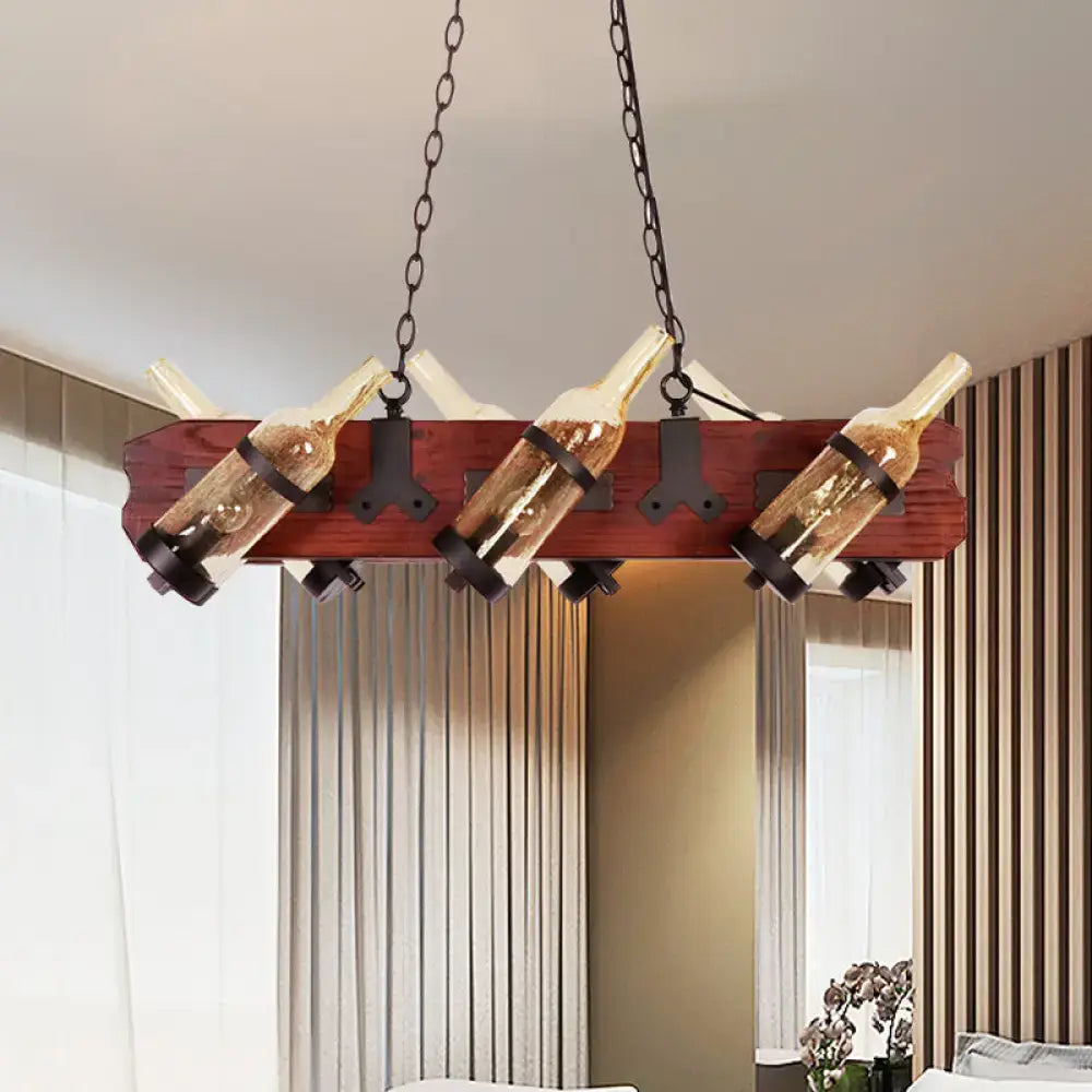 Rustic island lamp with brown wood arm featuring frosted white and amber glass wine bottle lights suspended by black metal chains