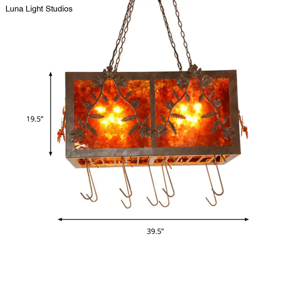 Rustic amber glass rectangular island light with dark metal leaf motifs for dining room lighting fixtures