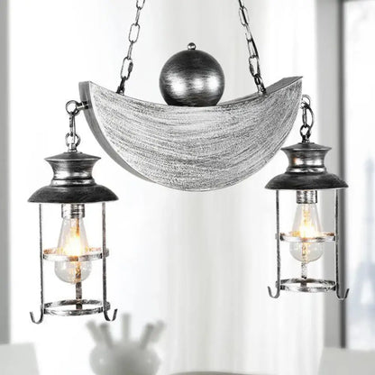 Decorbites rustic caged shade island lamp features aged silver crescent moon pendant with antique brass lanterns and clear glass