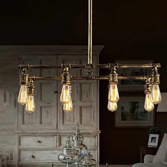 DecorBites™ rustic kitchen island pendant light with antique brass finish and five glowing filament bulbs in brass finish