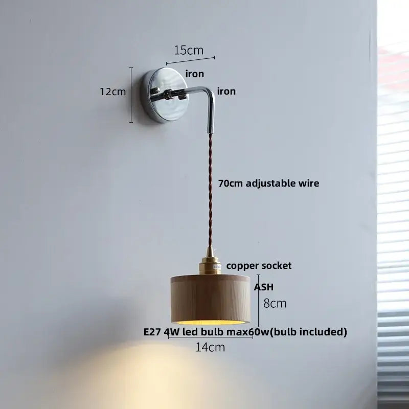 Rustic ash wood led wall light with pull chain featuring a minimalist polished iron bracket and adjustable copper wire shade