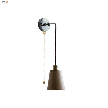 Rustic ash wood led wall light with matte wood shade, brass accents, and adjustable pull chain for bedroom use