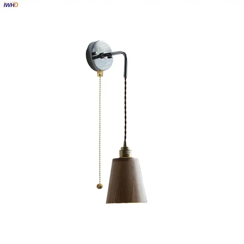 Rustic ash wood led wall light with matte wood shade, brass accents, and adjustable pull chain for bedroom use