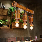 DecorBites™ rustic bamboo pendant light with three rope-wrapped cylindrical fixtures and exposed bulbs chain cord 220v-240v