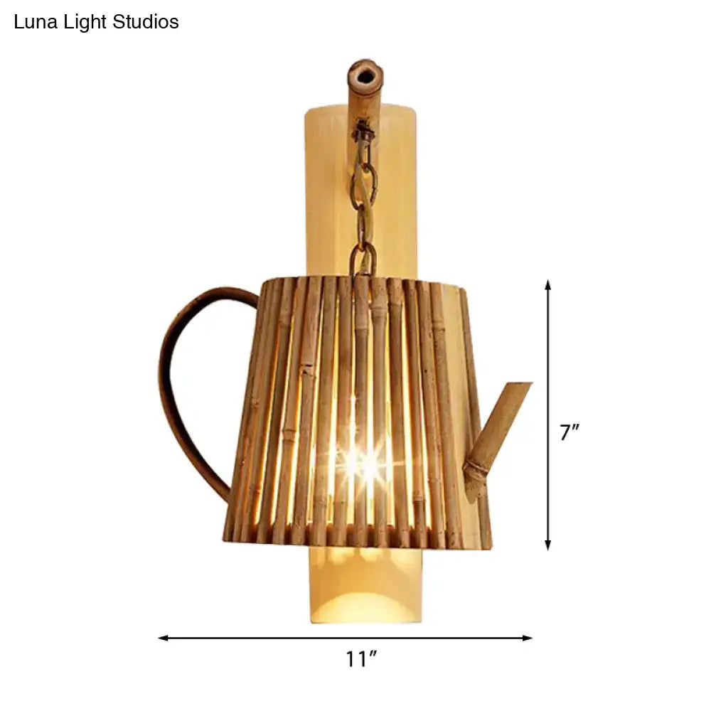 Rustic bamboo cylinder house sconce light fixture shaped like a wood cylinder house teapot with warm glowing interior