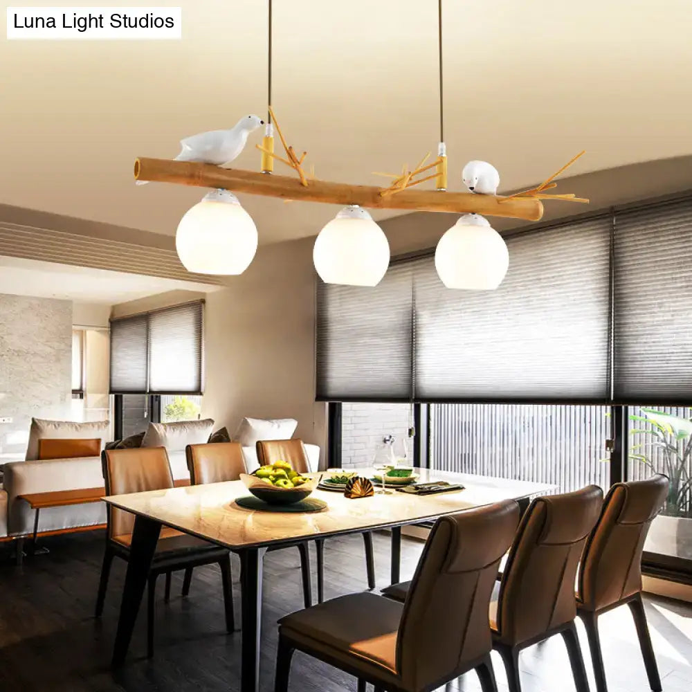 DecorBites™ modern cream glass wood pendant light fixture with white bird deco and dome island design features three shades