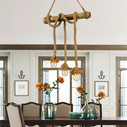 Rustic nautical-style decorbites adjustable rope island light with beige bamboo rod and thick rope suspending three bulbs