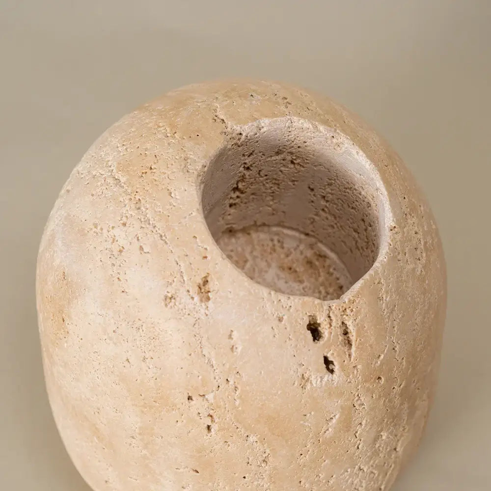 Rustic beige travertine match holder with rough textured surface and natural imperfections for living room decorbites decor