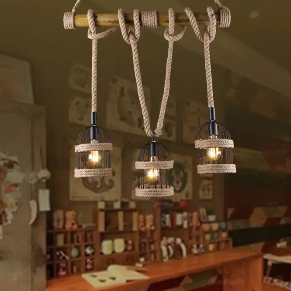 Decorbites farm birdcage island lamp is a 3-light ceiling light with black metal frames and beige jute rope cord suspension