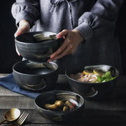 Rustic black ceramic sushi plate and bowl set with gold brushstroke accents and integrated handles for decorbites black ceramic collection