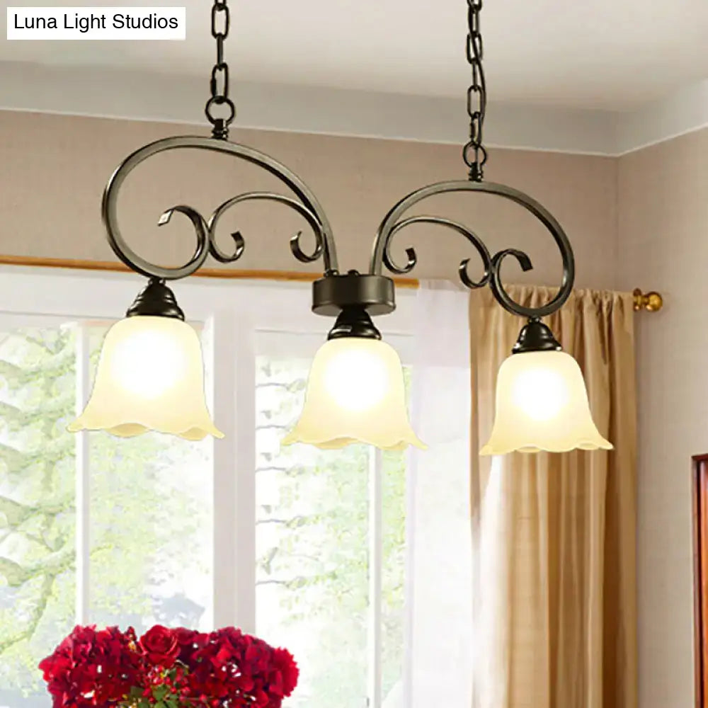 DecorBites rustic black wrought iron chandelier with black floral swirls and three frosted white glass bell shades ideal for restaurants