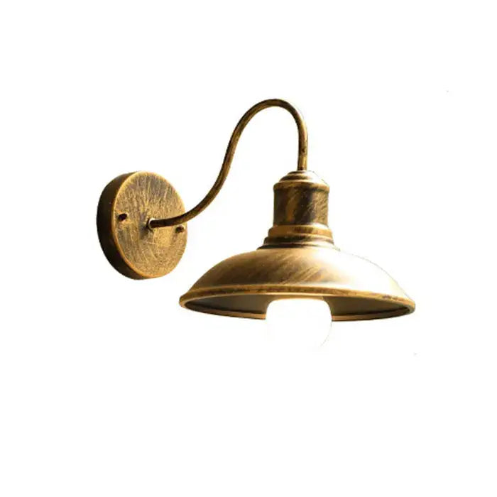 Antique brass farmhouse-style wall sconce with curved arm and dome-shaped shade for decorbites black rustic light fixture