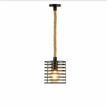 Rustic black iron pendant light with hemp rope suspension and exposed bulb for dining room lighting