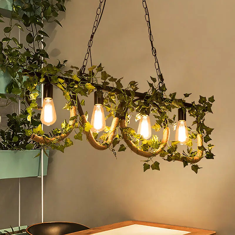 Decorbites black metal 4-light linear island lamp with exposed edison bulbs, ivy vines, and woven rope accents