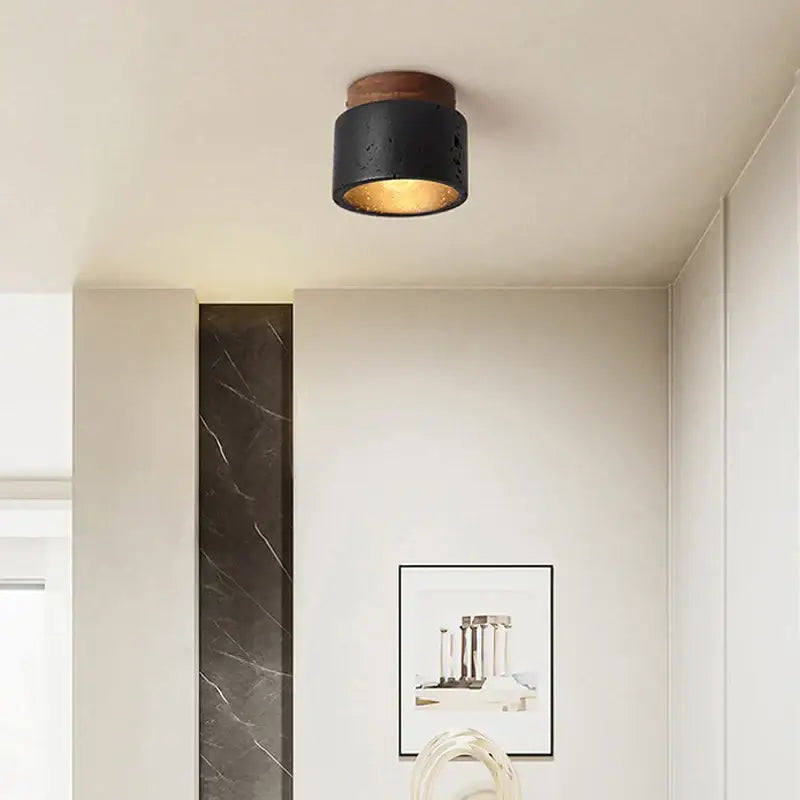 Rustic black travertine ceiling light with wooden top and warm glow ideal for entrance hallway decorbites black travertine