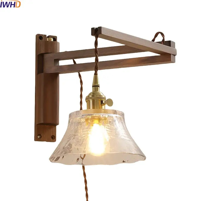 Rustic brass and clear glass wall sconce with a wooden mount and textured translucent shade for stair lighting decorbites clear glass