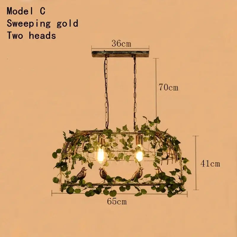 Rustic bronze iron bird cage chandelier with sweeping gold two-head light and iron bird cage greenery decorbites iron bird