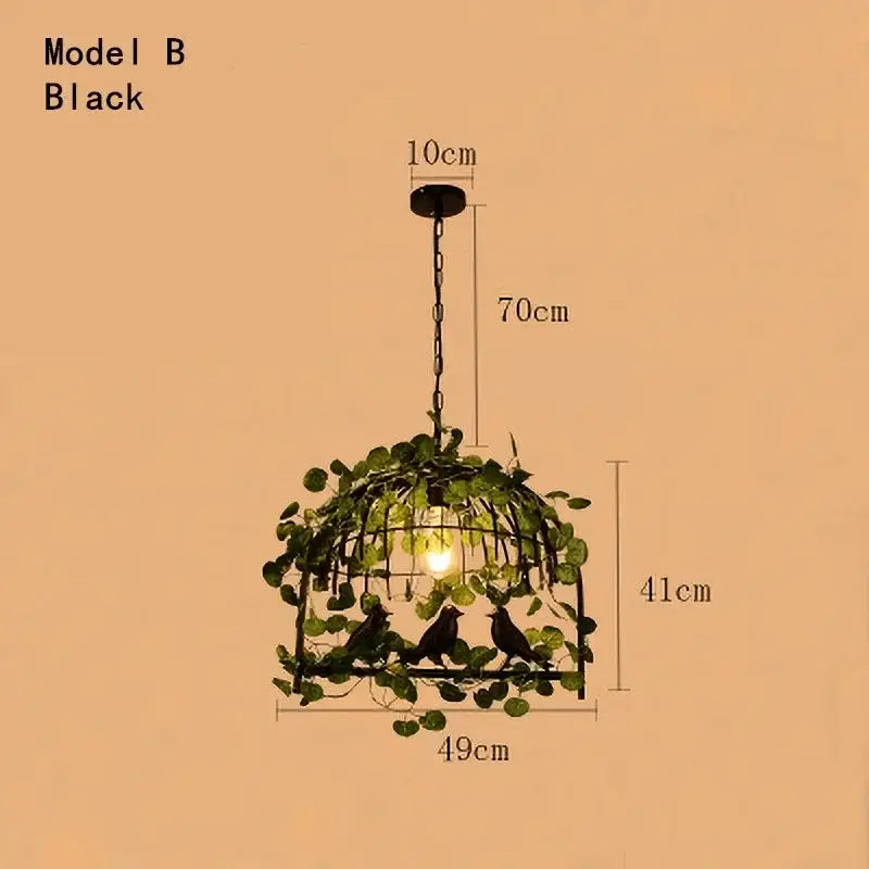 Rustic bronze iron bird cage chandelier with black metal frame, artificial green vines, and three silhouetted birds for dining room decorbites iron bird cage lighting