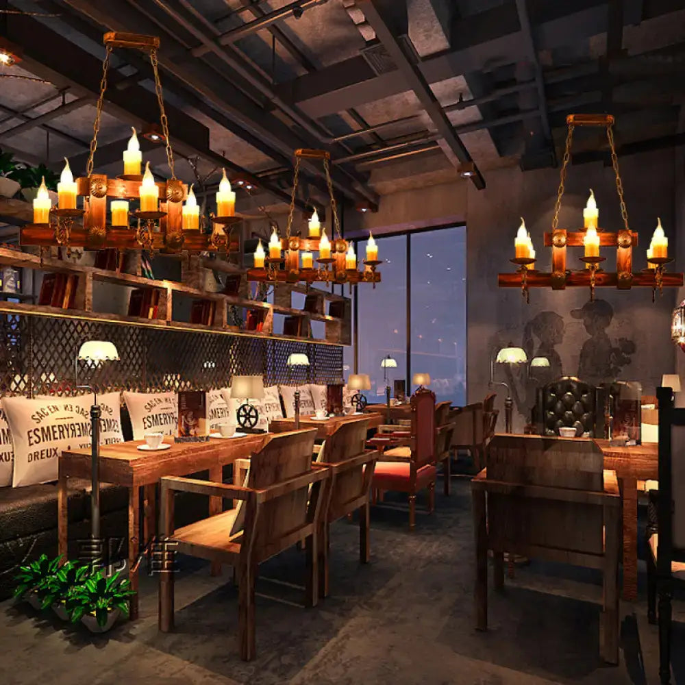 Rustic brown candle island lighting fixture with wooden chandeliers and multiple candle-like bulbs hanging in dining room
