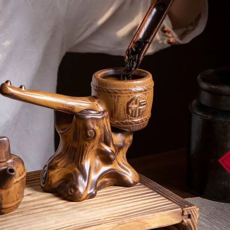 Rustic brown ceramic tea set featuring a hand-carved wooden tea strainer with natural finish for tea brewing decorbites ceramic kung