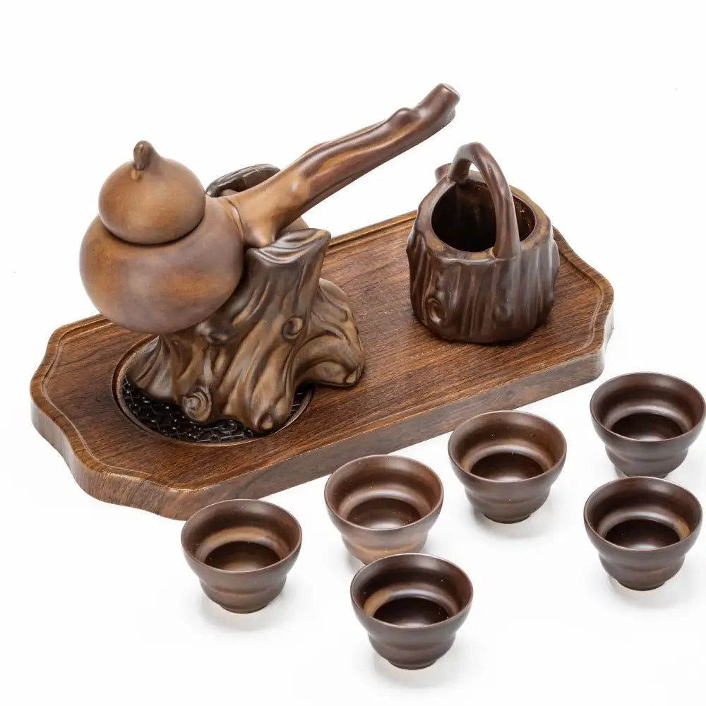 Rustic brown ceramic tea set with gourd-shaped teapot tree-root base matching cups and bucket on wooden tray decorbites ceramic kung