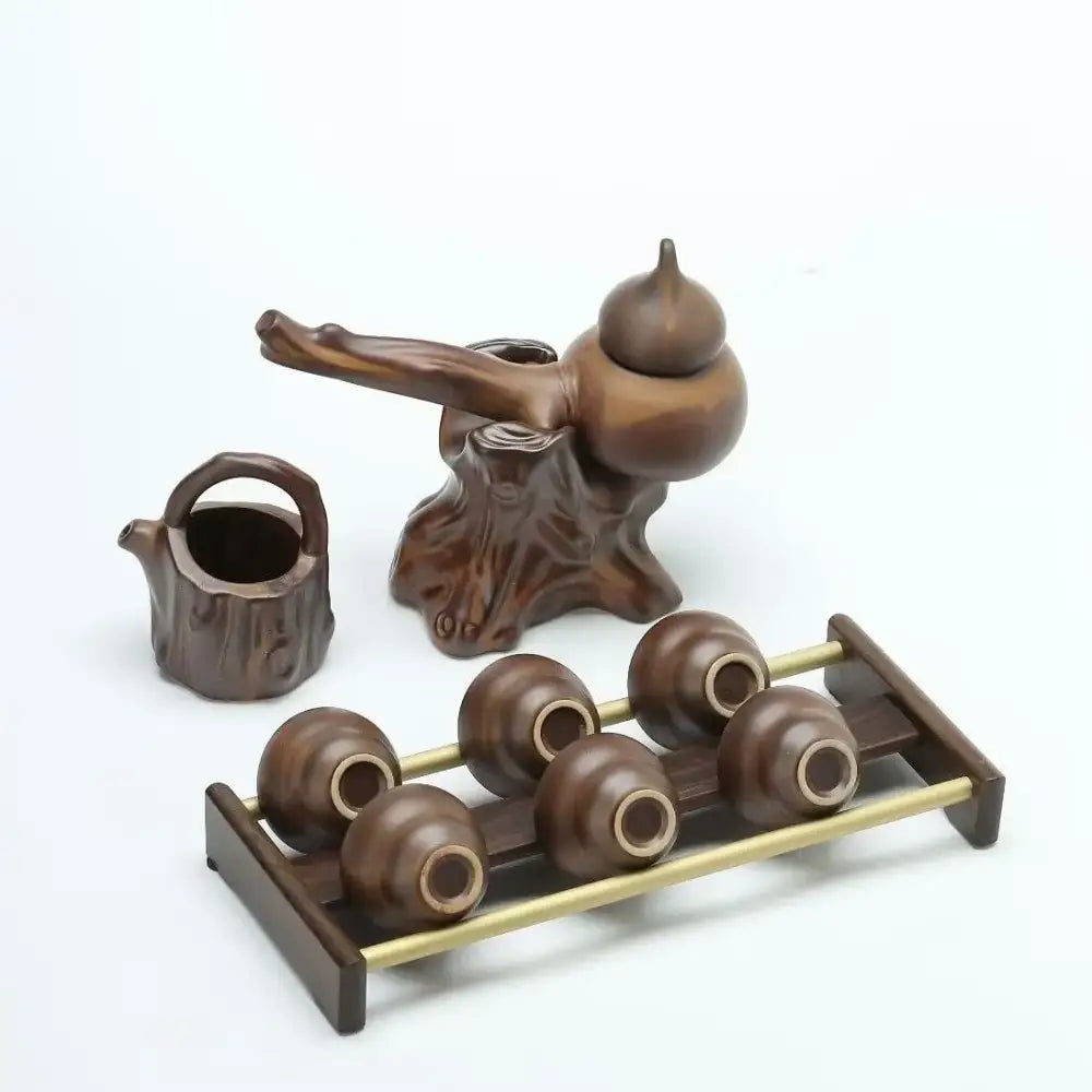 Rustic brown ceramic tea set with tree stump base and gourd shaped lid for tea brewing by decorbites ceramic kung