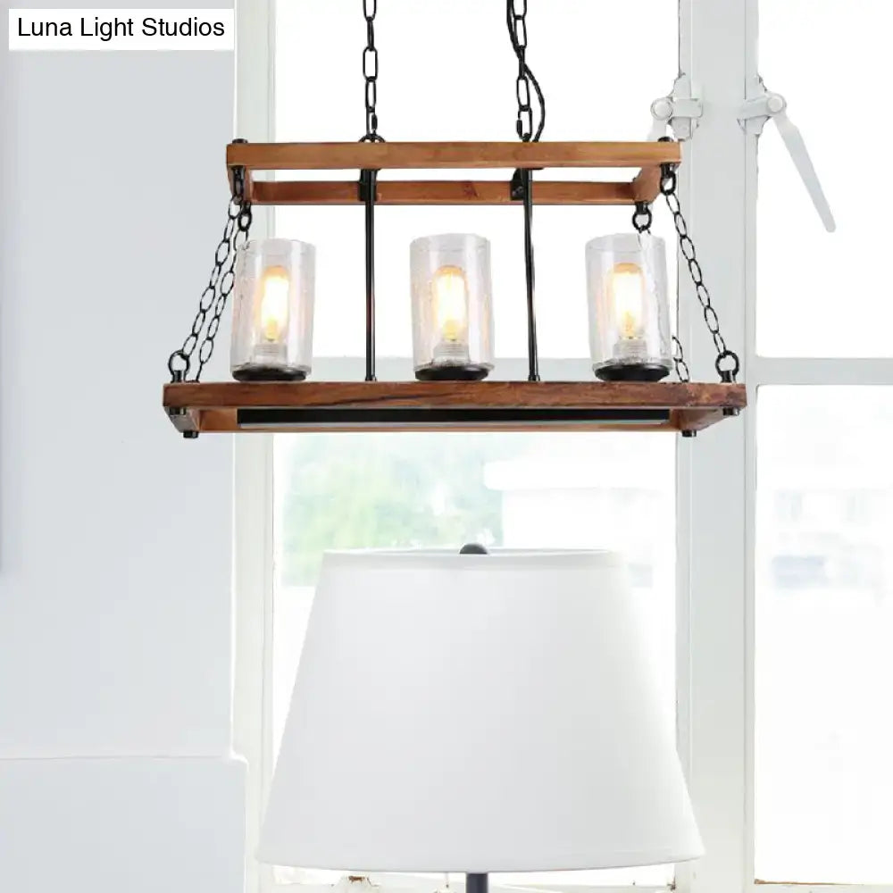 Rustic brown pendant light with wooden trapezoid guard and seeded glass candle holders on black metal chains for living room