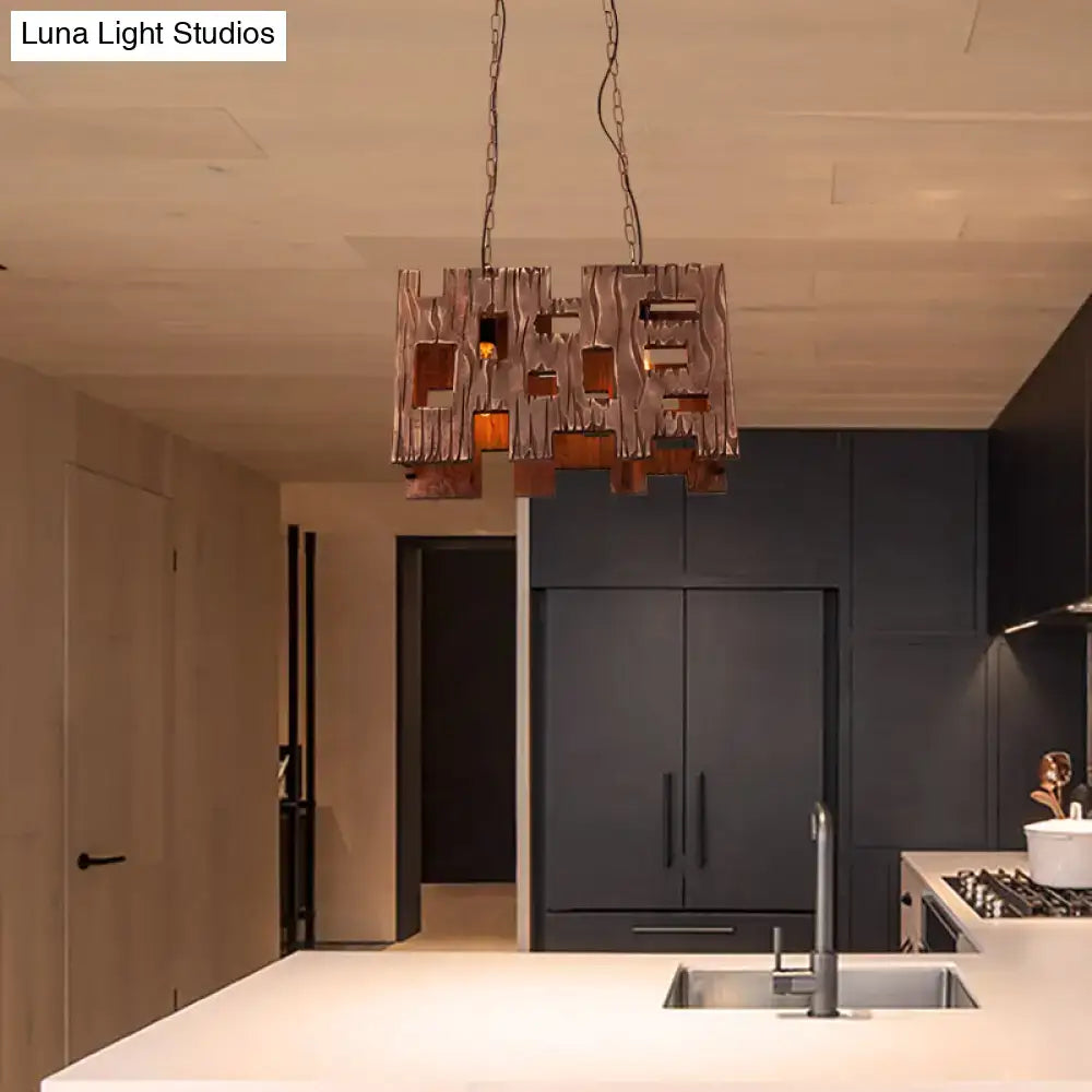 Rustic copper rectangular restaurant island chandelier with copper-toned geometric design and amber glass accents