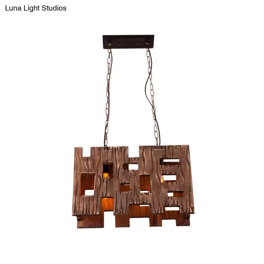 Rustic bronze metal pendant island chandelier with textured wood-like design and cut-out patterns for restaurant island use