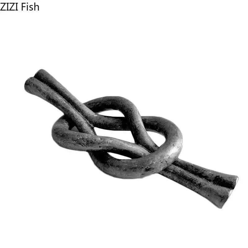 Rustic dark metal geometric knot resin sculpture with textured finish ideal for living room decorbites geometric knot artwork