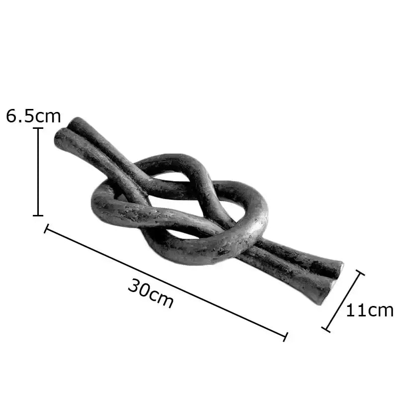 Rustic dark metal geometric knot resin sculpture with textured finish ideal for living room decorbites geometric knot