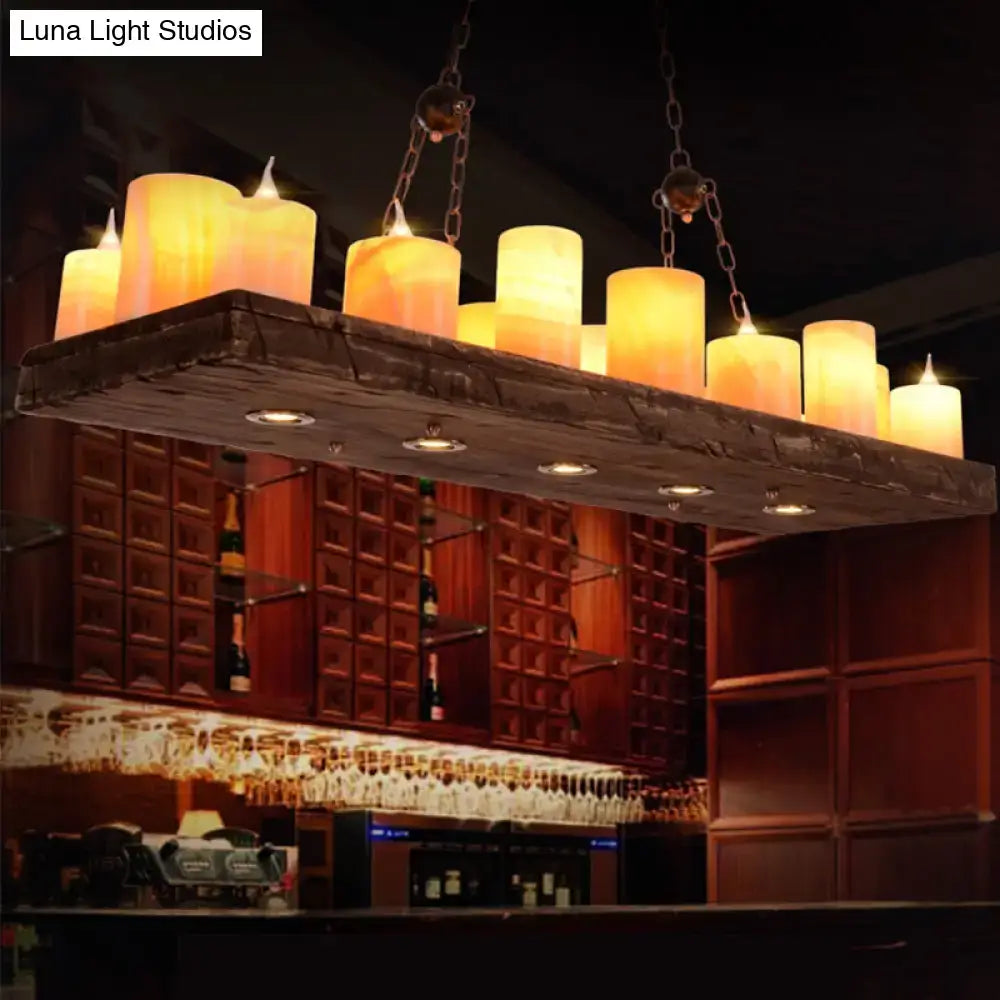 Rustic dark wood and amber candle light fixture with warm glowing led lights on a ceiling light in 220v-240v