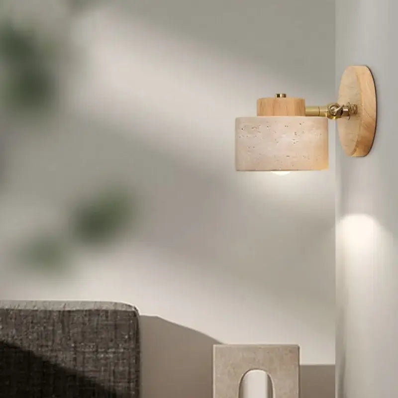 Rustic dark wood and beige concrete wall light with brass hardware and natural wood accents for bedroom decorbites iron rotate
