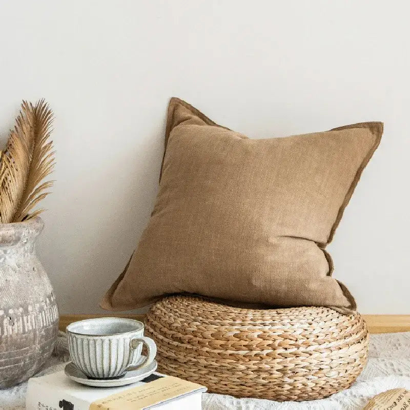 Beige linen fringed pillow cover with subtle texture and neat stitching for rustic earthy tones living room decorbites decor