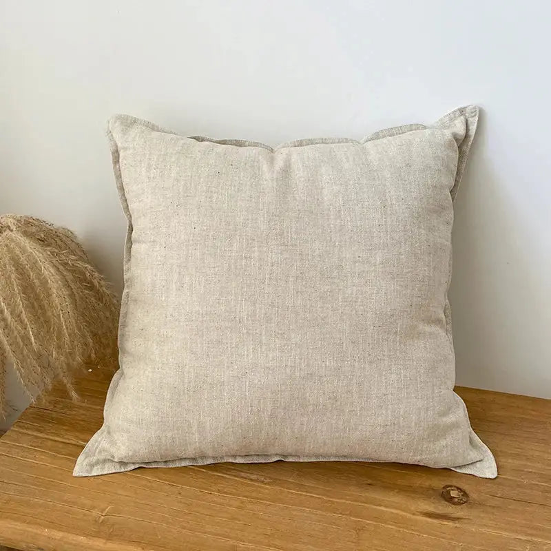 Beige linen fringed pillow cover with subtle textured weave and softly frayed edges for rustic earthy decorbites decor