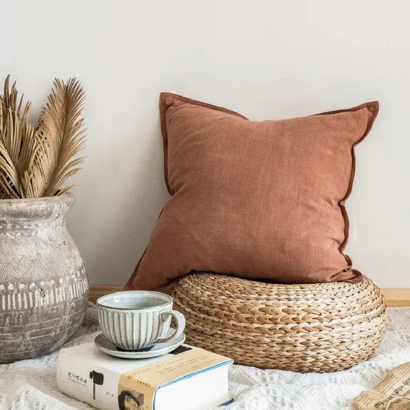 Rust-colored linen fringed pillow cover with subtle texture and neat stitching for rustic living room decorbites decor