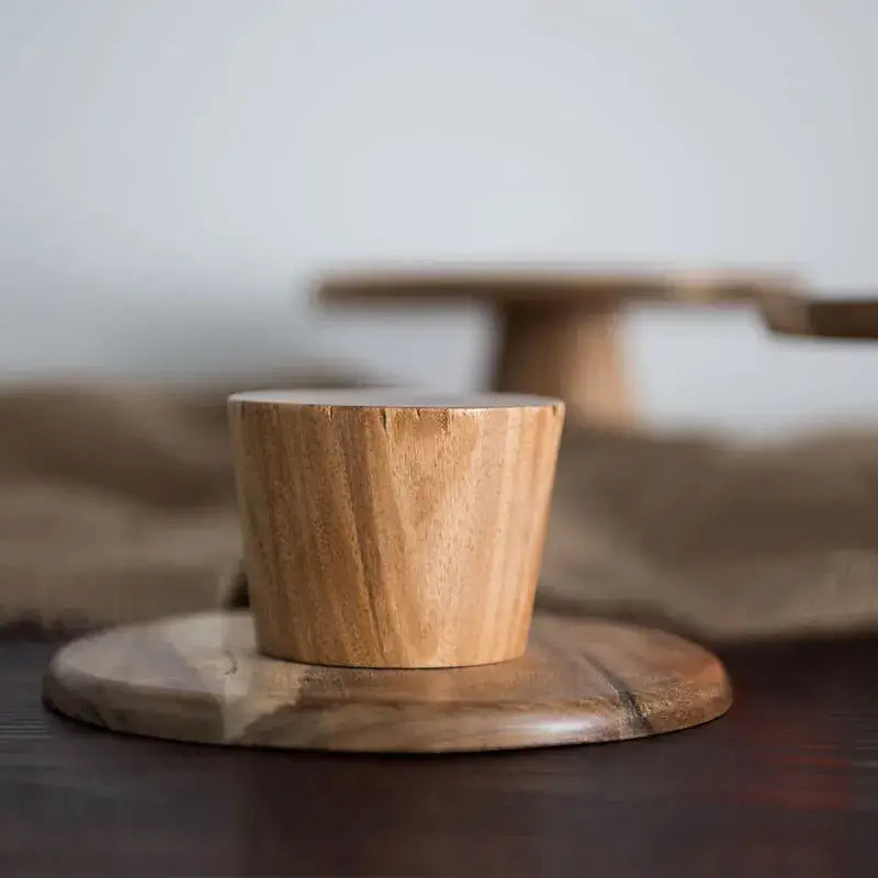 Rustic decorbites elevated wooden cake stand set featuring a natural wood cylindrical coaster on a matching base
