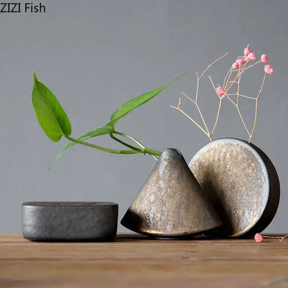Matte gold and black coarse pottery vase small with conical shape holding pink flowers for living room decorbites decor