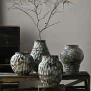 Four rustic gray and white coarse pottery vases with hammered finish ideal for decorbites coarse pottery home decor
