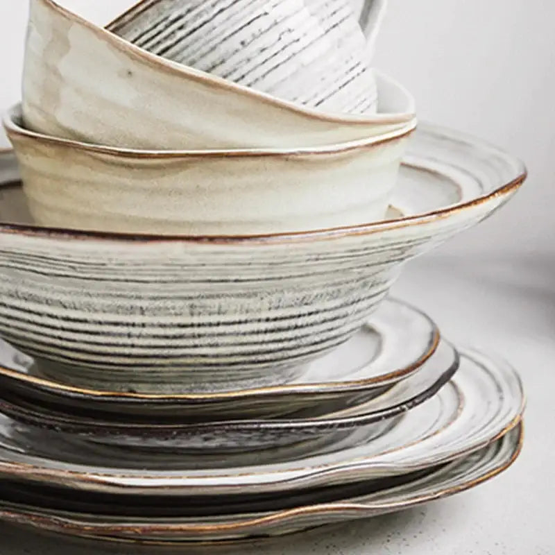 Stylish rustic grayish white ceramic dish bowl set with handcrafted texture and earthy brown rims for dining room use