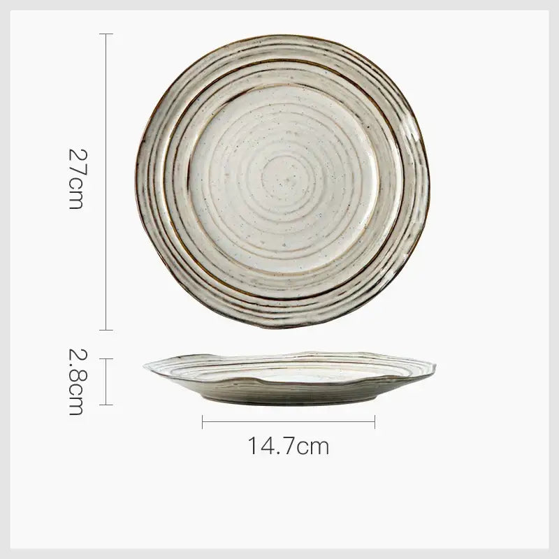 Rustic grayish white ceramic dish bowl set featuring concentric ridges and a speckled glaze with raised rim