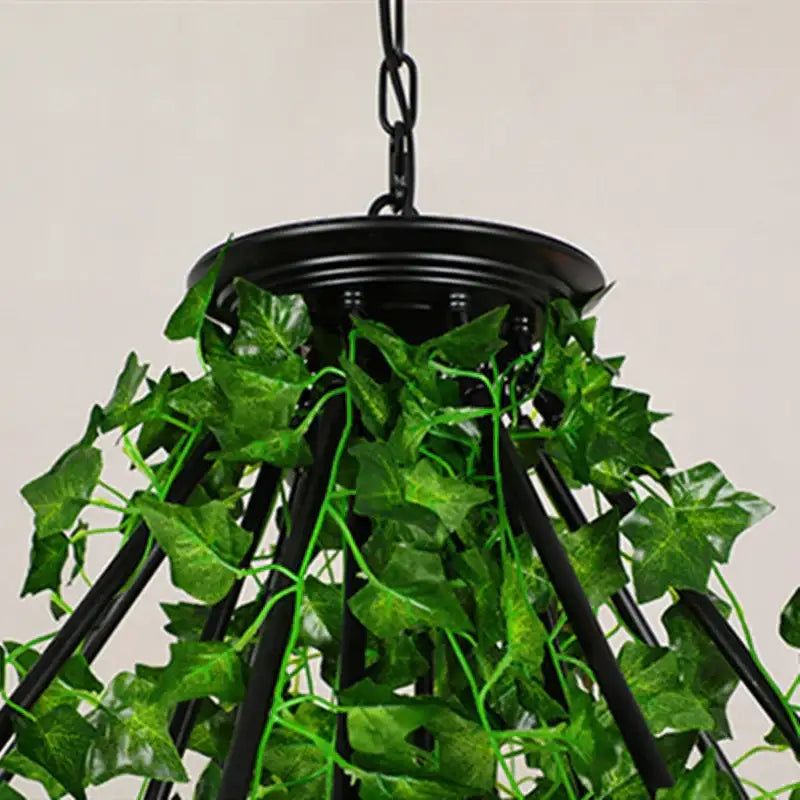 Black metal green leaf chandelier adorned with lush artificial ivy leaves ideal for bar dining room lighting