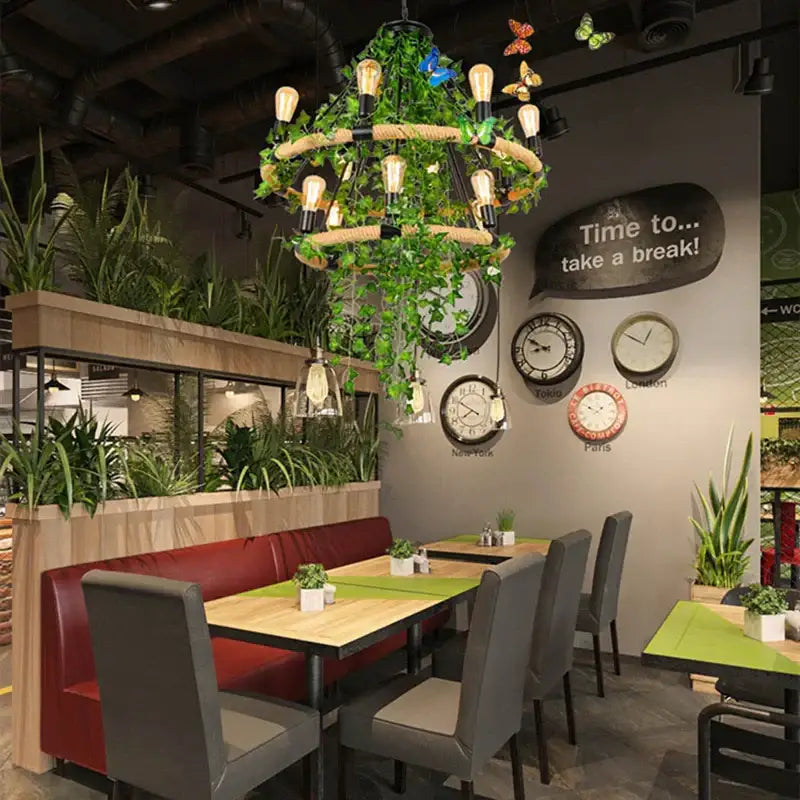 Rustic green leaf chandelier with woven rope rings and colorful butterfly decorations for bar dining room lighting