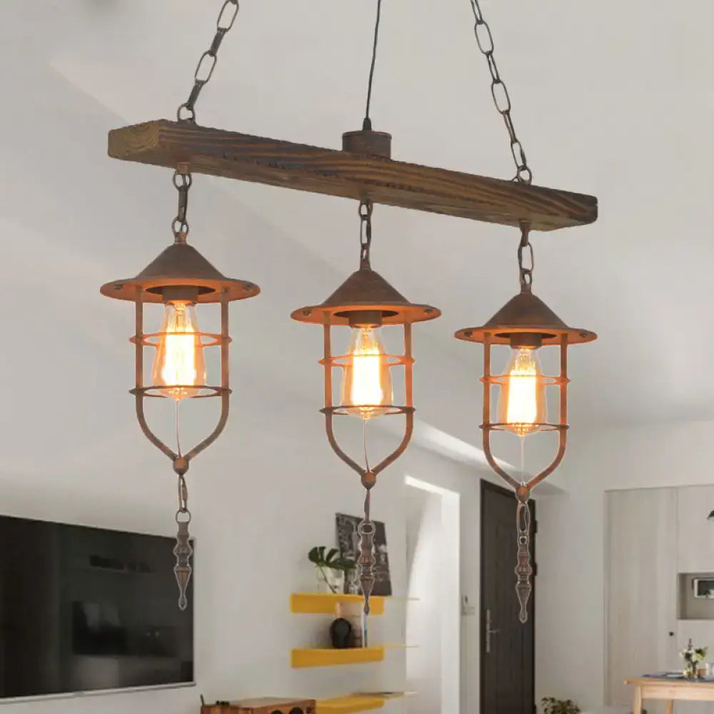 DecorBites™ caged rustic metal pendant light fixture with three exposed edison bulbs and wooden beam suspension