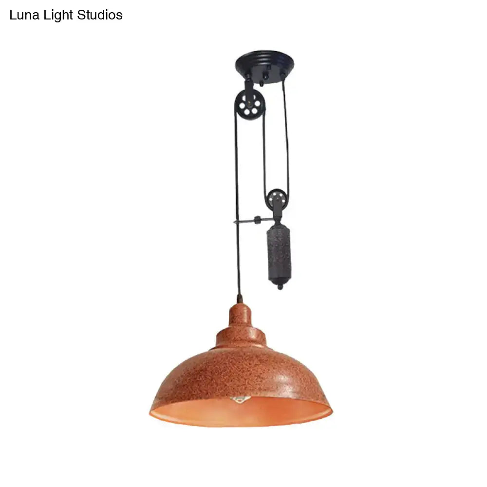 Copper-toned rustic industrial dome pendant lamp with pulley system and textured metal finish for living room lighting