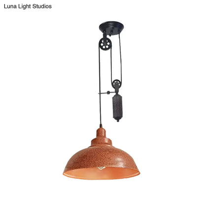 Copper-toned rustic industrial dome pendant lamp with pulley system and textured metal finish for living room lighting