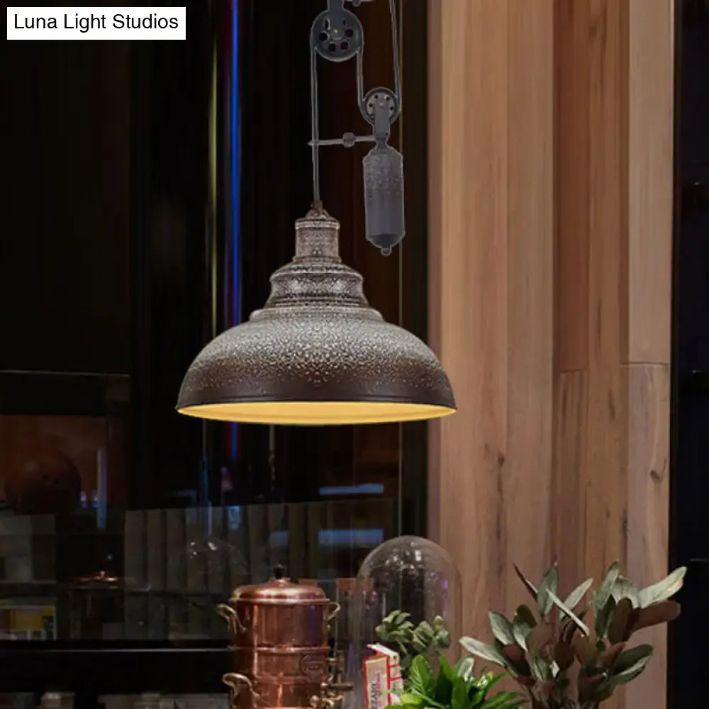 DecorBites rustic industrial dome pendant lamp with dark metallic finish and warm yellow glow for living room lighting